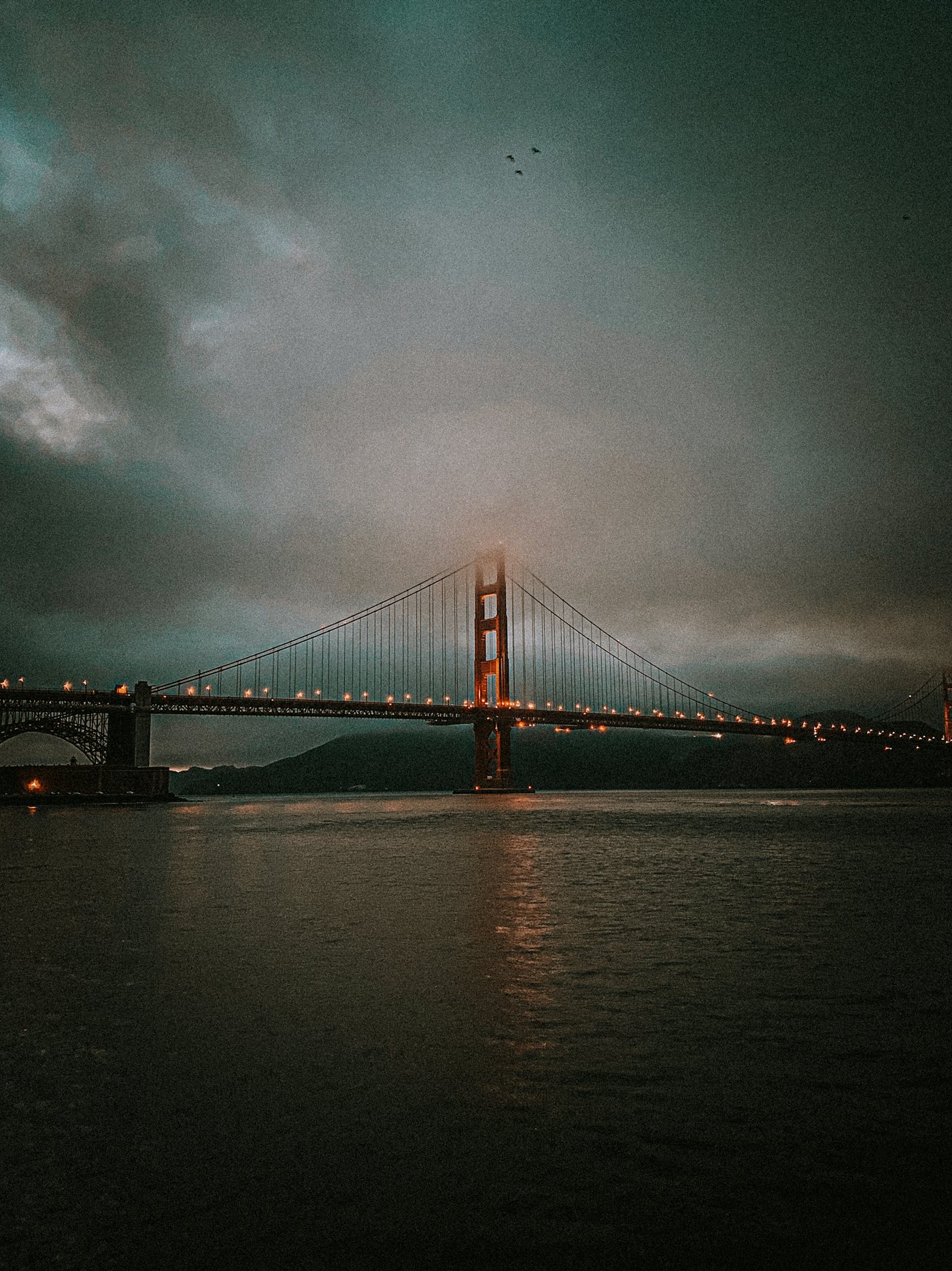 Golden Gate Bridge in the evening fog, San Francisco